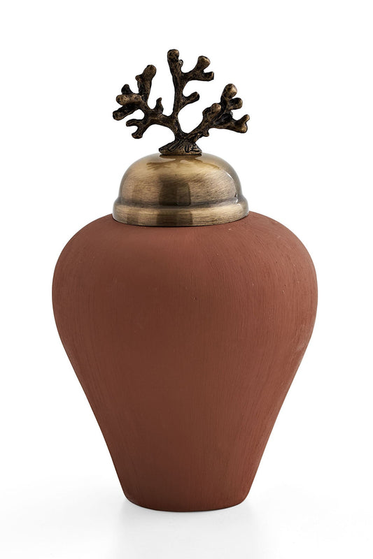 Petit objet avec capuchon en métal