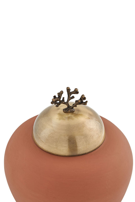 Petit objet avec capuchon en métal
