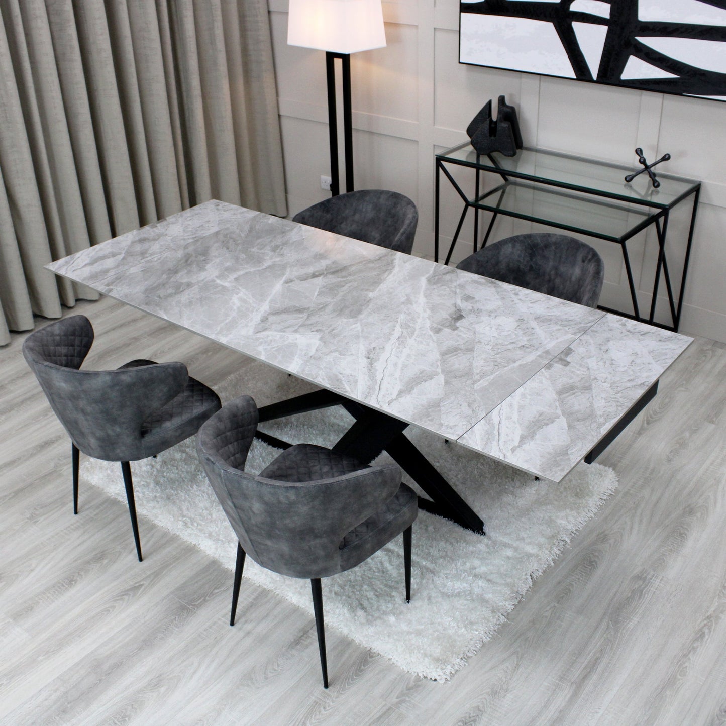 Table à manger extensible en céramique grise effet marbre avec base noire