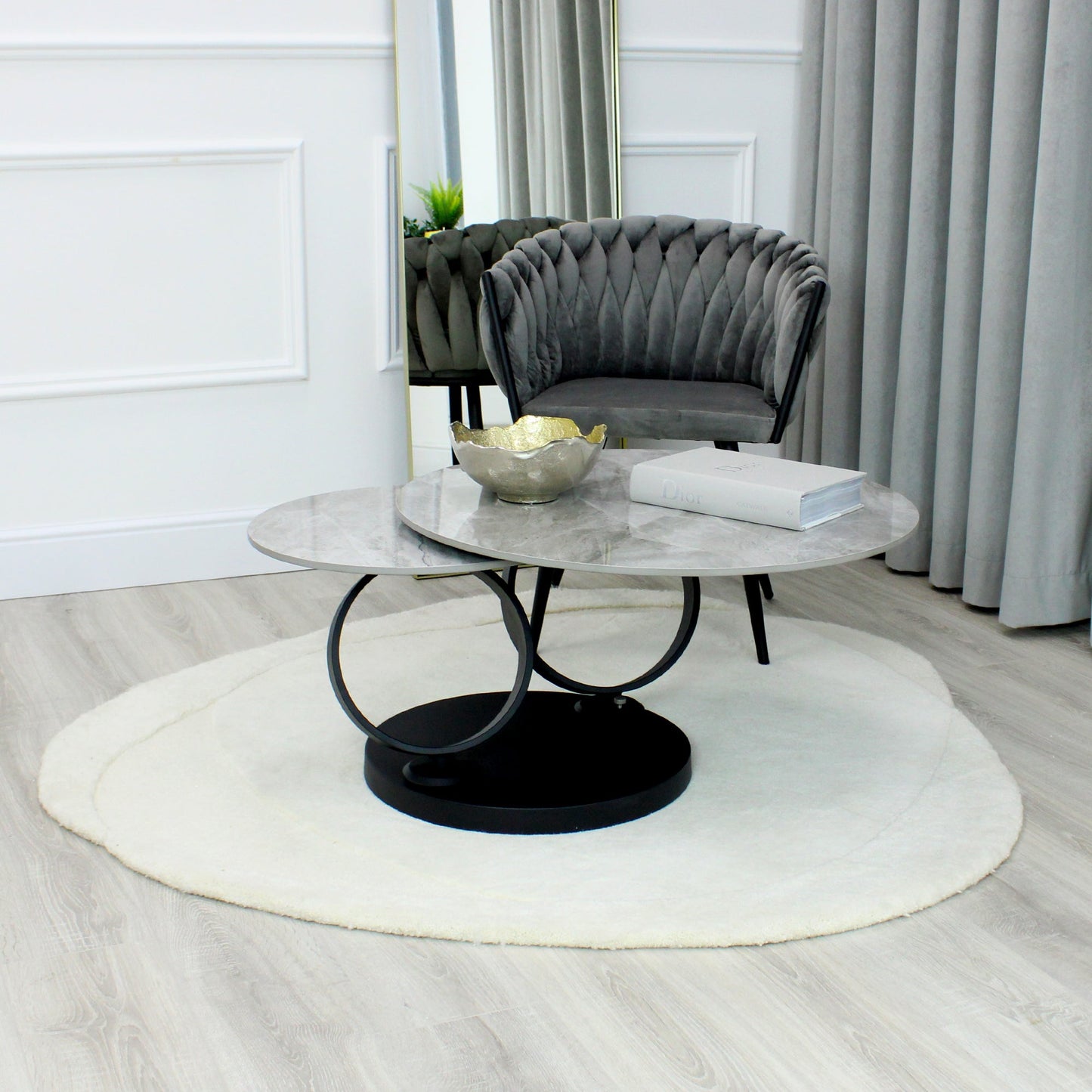 Table basse pivotante en céramique grise effet marbre avec base noire