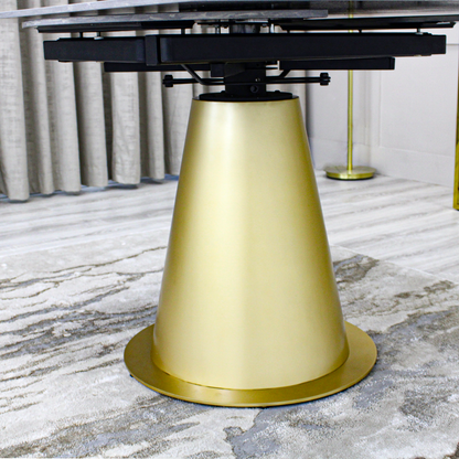 Table à manger ronde extensible en céramique noire effet marbre avec base dorée