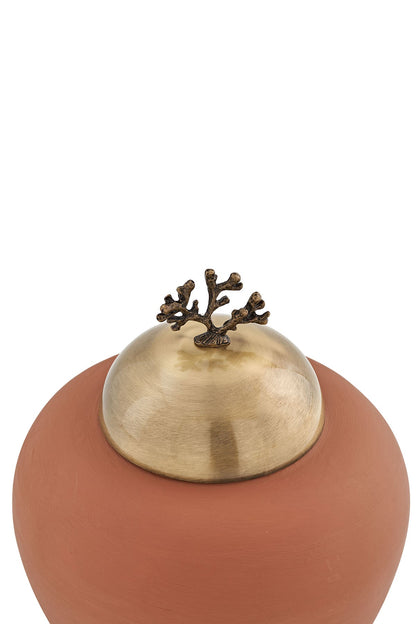 Petit objet avec capuchon en métal