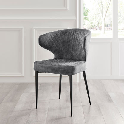 Chaise de salle à manger Levi en velours gris avec pieds noirs matelassés