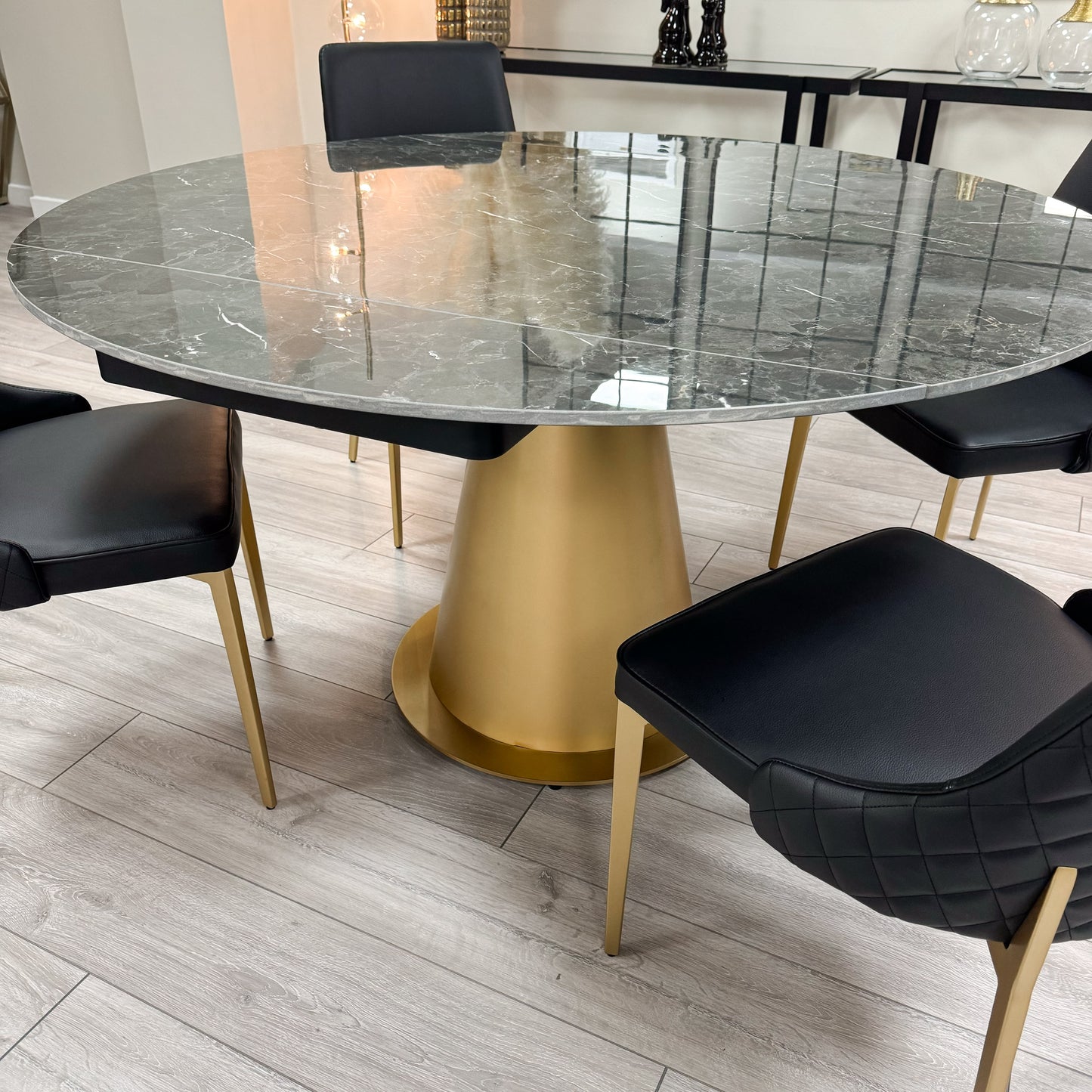 Table à manger ronde extensible en céramique noire effet marbre avec base dorée