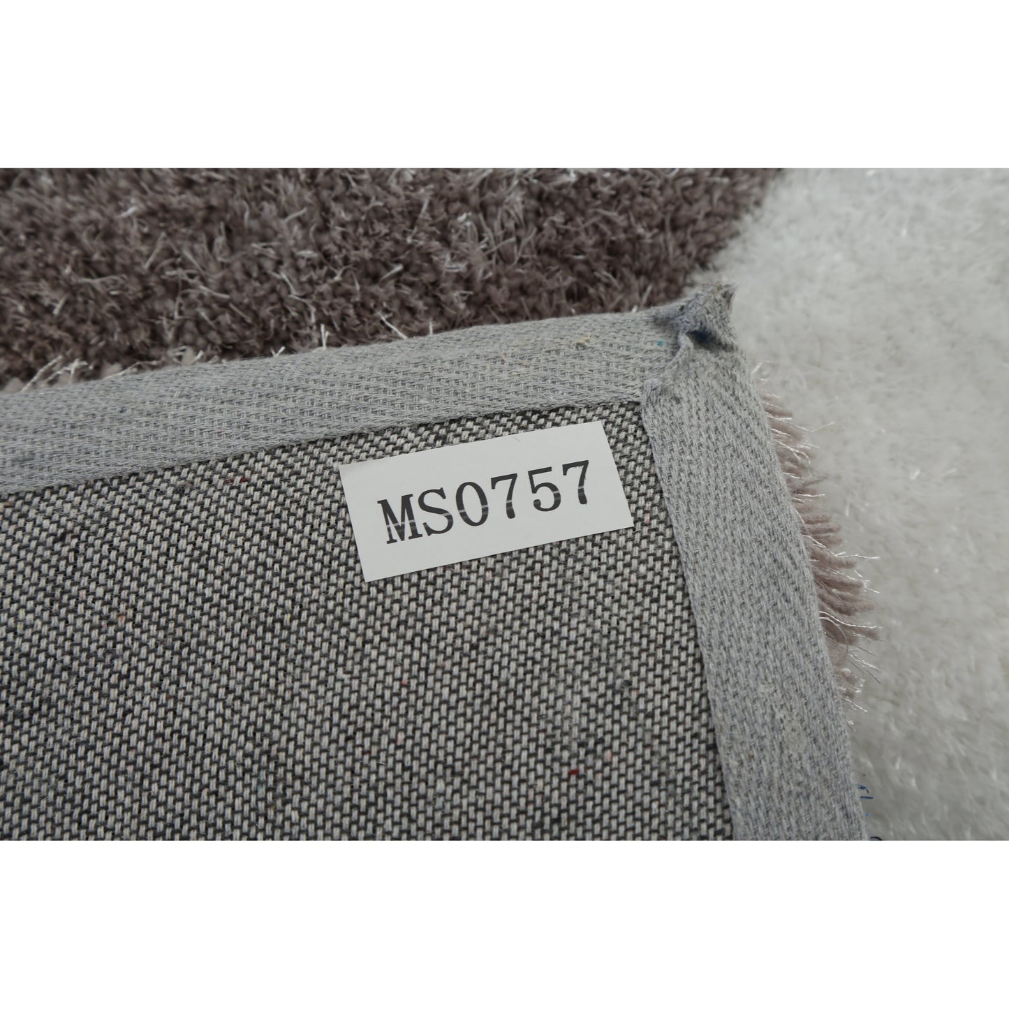 Tapis à poils longs Mateos au design abstrait