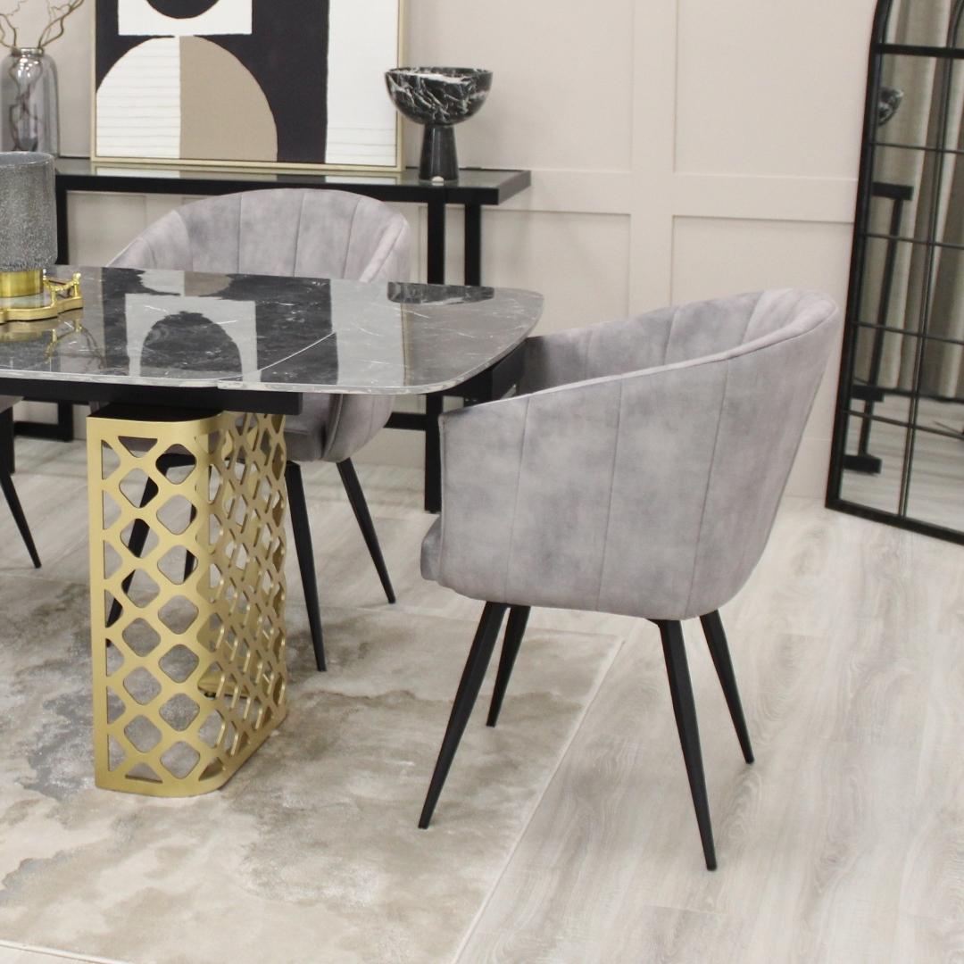 Table à manger extensible en céramique noire effet marbre avec base dorée