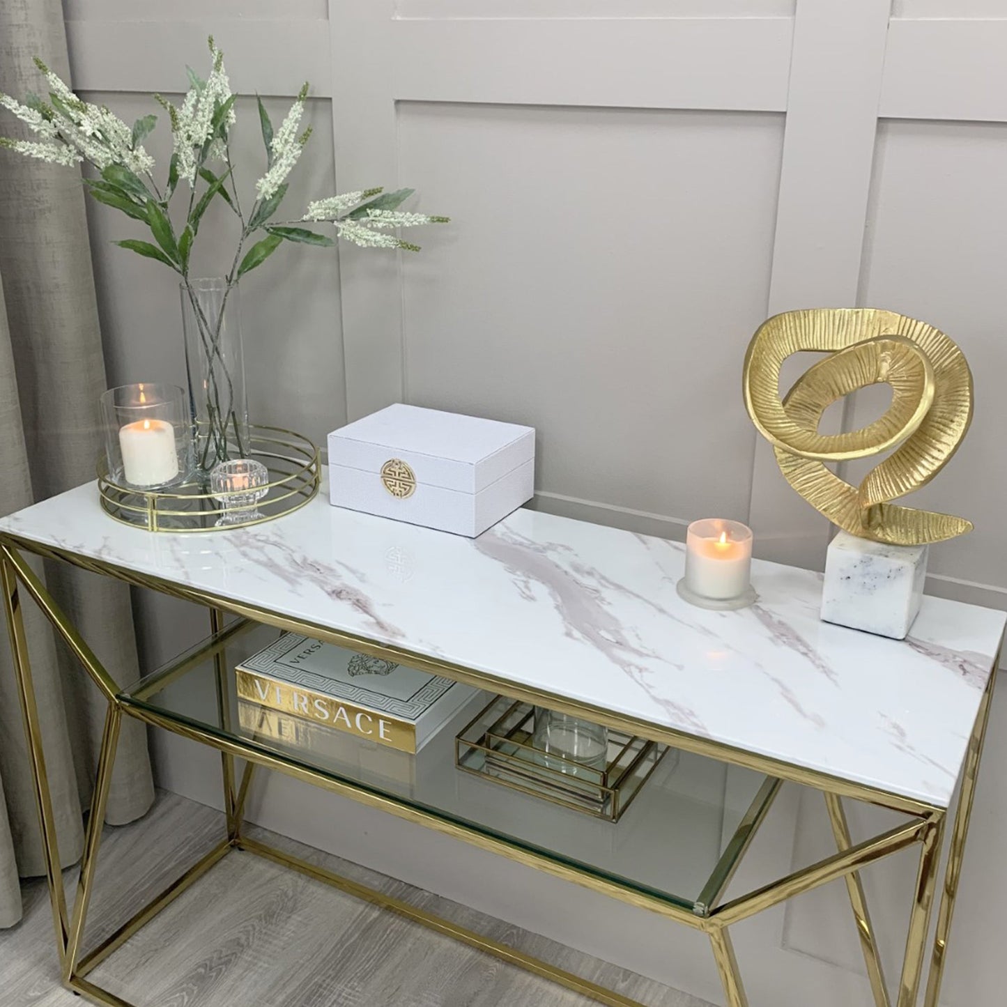 Console Ava Gold avec plateau effet marbre blanc