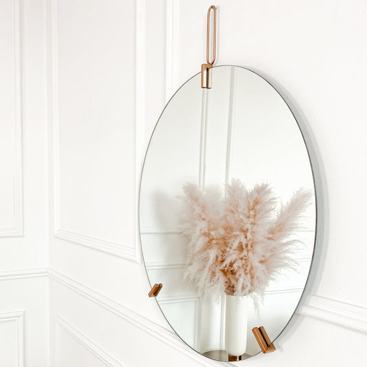 Miroir rond doré minimaliste