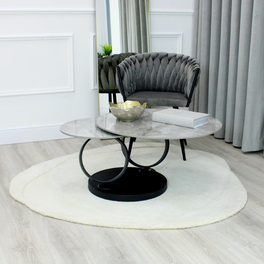 Table basse pivotante en céramique grise effet marbre avec base noire